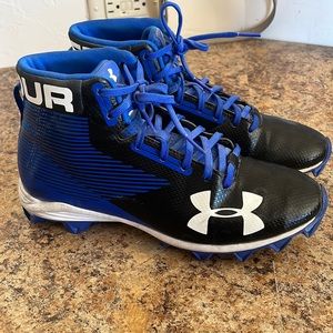 UA youth football cleats